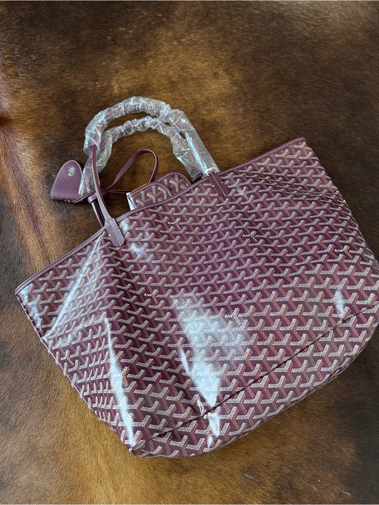 Goyard Handbags - Goyard's most celebrated shopper tote
on its largest size.